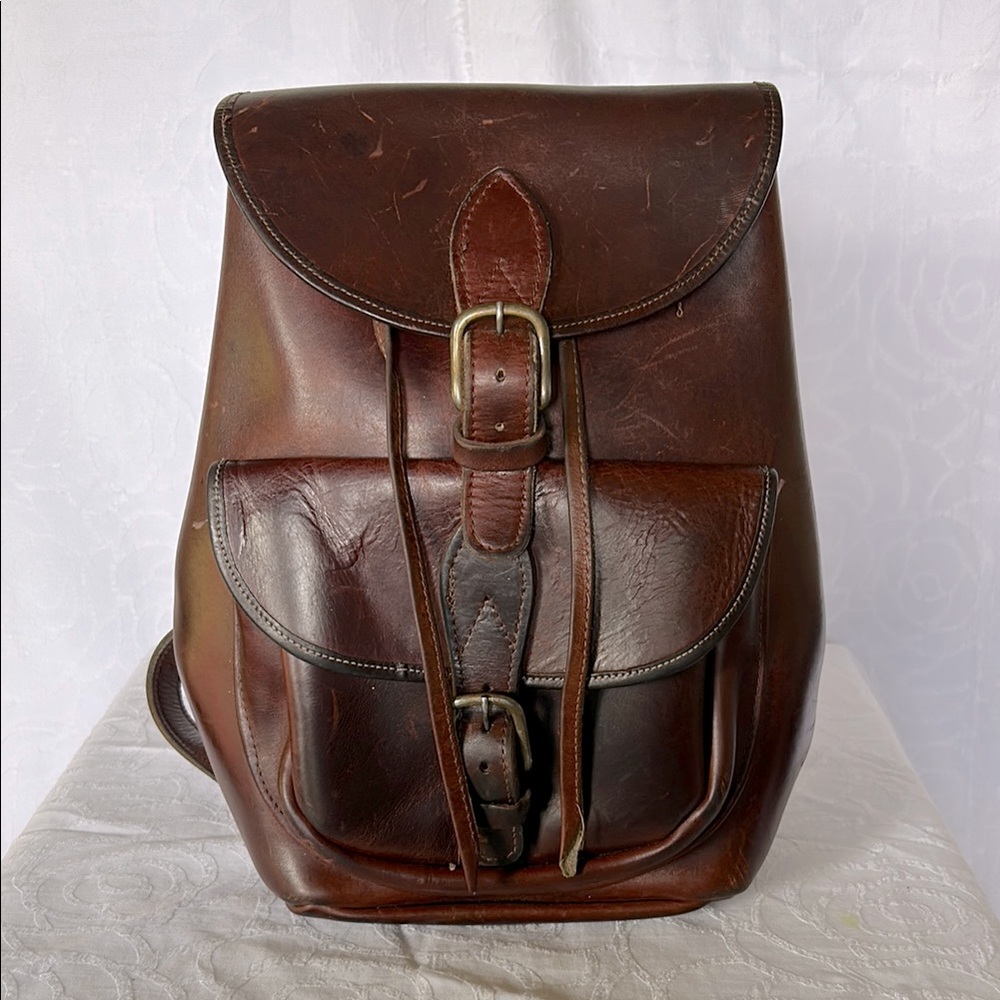 Saddle dark brown durable leather Buckled Drawstring Backpack. Travel/work bag.